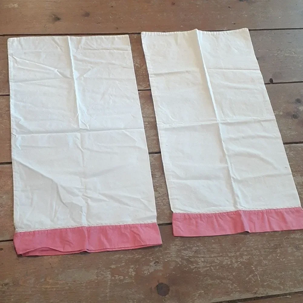 ‎vintage pillowcases with pink edging and pink rick rack decor